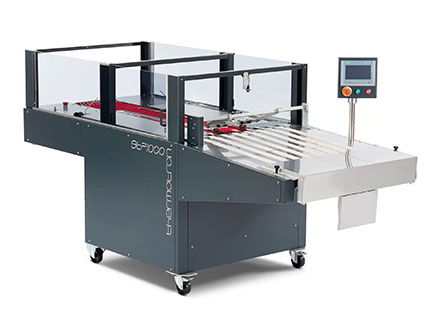STP1000 automatic folding machine by Thermotron folding garments at high speed